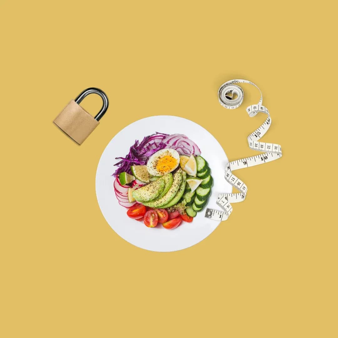 Plate of healthy food including avocado, boiled egg, tomatoes, cucumbers, and red onion on a yellow background, accompanied by a measuring tape and a padlock symbolizing diet control and weight management.